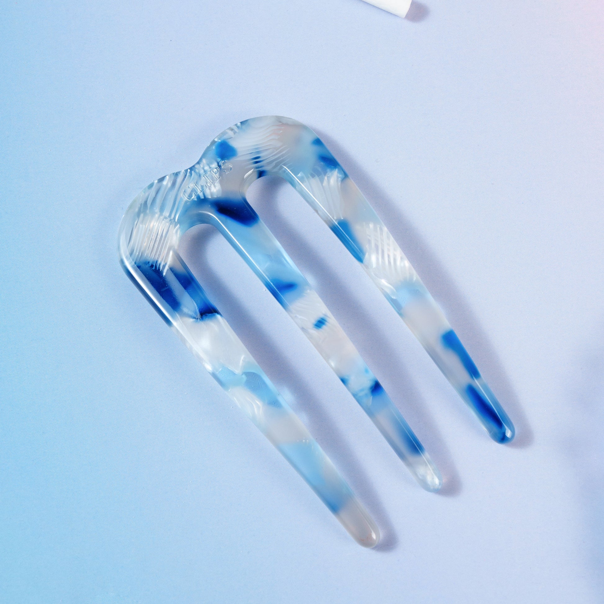polly french pin clip glad fijn haar blauw gevlekt